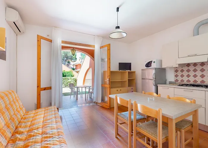 Апартаменты Villaggio Capistrano Бибионе